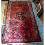 An Iranian red ground Zanjan rug, 224cm x 125cm