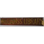 A Vintage painted advertising panel "Williamss Library", L220cm