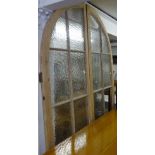 A pair of pine-framed lattice glazed internal doors, W138cm, H215cm approx.