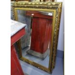 A pair of modern gilt-framed bevelled-edge wall mirrors, and another