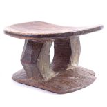 An African Tribal carved hardwood stool, height 14cm