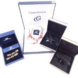 A Claire Garnett boxed necklace and earring set, 2 Links of London pendants, and a Swarovski pendant