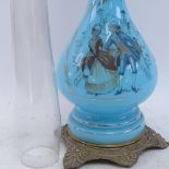 A stencilled blue glass brass Duplex oil lamp, height excluding chimney 57cm