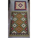 A small Kilim rug, 92cm x 60cm, and another 50cm x 50cm (2)