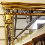 A modern gilt-framed wall mirror, overall height 89cm