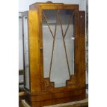 An Art Deco walnut display cabinet with single glazed door