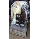 A Venetian style wall mirror with applied decoration, W60cm