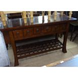 A hardwood console table, with 2 frieze drawers and lattice under tier, on splayed legs, W127cm