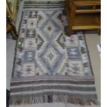 A flatweave Kilim rug, 180cm x 110cm