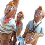 4 carved and painted hardwood Tintin figures, largest height 32cm (4)