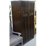 A 1940s oak 2-door wardrobe