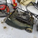 A Hayter Harrier 56 rotary petrol mower, with grass box