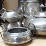 A collection of various English pewter, including Arts and Crafts Homeland 3-piece tea set,