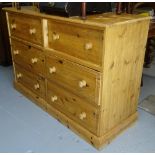 A modern polished pine 6-drawer chest, W132cm