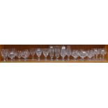 A shelf of crystal drinking glasses