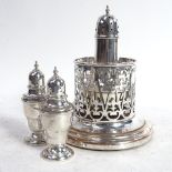 A pair of Goram sterling silver peppers, a silver sugar caster, Birmingham 1930, and a silver plated