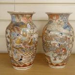 A pair of Satsuma vases with painted and gilded figures, height 25cm