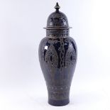 An Art Nouveau blue glazed ceramic jar and cover, height 55cm