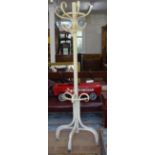 An Edwardian painted half bentwood hat and coat stand