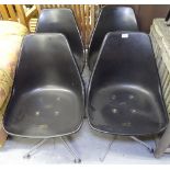 A set of 4 mid-century Morris Burke Arkana 115 swivel chairs on chrome star bases stamped to the
