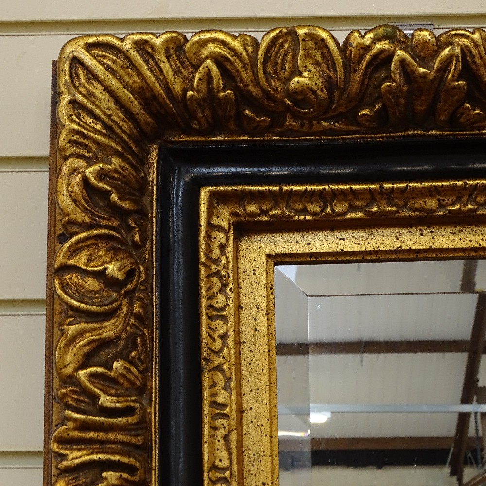 An ornate gilt-framed bevelled-edge wall mirror, frame height 52cm - Image 2 of 2