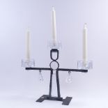 A Mid-Century Swedish cast-iron and clear glass 3-light candelabra, glass inserts and drops with