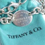 A Return to Tiffany & Co silver link bracelet, complete with box and bag