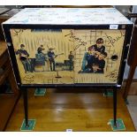A 1960s Beatles record cabinet on Dansette legs, W61cm