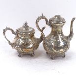 An ornate Victorian silver plated teapot and matching coffee pot, with all over embossed and