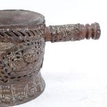 An Eastern copper-mounted mortar, pierced and embossed decoration, height 14cm