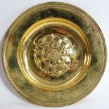 A modern silver-gilt dish with Tudor Rose centre, London 1963, retailed by Hicklenton & Phillips,