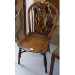A Victorian elm and yew wood wheel-back side chair, with crinoline stretcher