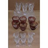 Crystal Sherry glasses, matching Brandy balloons and liqueurs, and 6 amethyst overlay glasses