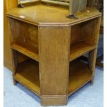 An Art Deco oak octagonal centre standing book table, W60cm