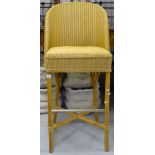 A Lloyd Loom wicker bar stool, with label to the underside of the seat