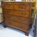 A George III mahogany bachelor's chest, with brushing slide, 2 short and 3 long drawers under, on