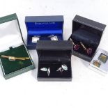A pair of hallmarked silver cufflinks, a pair of enamel decorated cufflinks, 2 other pairs, and a
