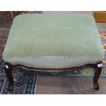 A stained beech-framed and upholstered footstool, on cabriole legs, W68cm