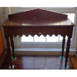 A Victorian mahogany hall table, raised back, end frieze drawer, raised on turned legs, W106cm