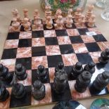 Hardstone and marble chess set on matching board, King height 7.5cm