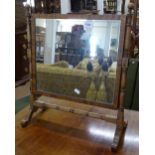 A Victorian mahogany-framed swing toilet mirror