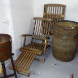 A pair of teak folding steamer chairs