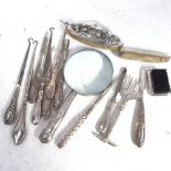 Silver-handled button hooks, tweezers, silver-mounted nail buffers, silver-handled magnifying