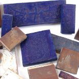 A group of Oriental carved wood and copper-fronted printing blocks, including character marks, Mount