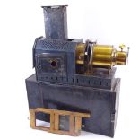 A Victorian W Butcher & Sons magic lantern, with tin carrying case and slide holder, length 42cm