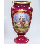 A Continental porcelain vase with painted panels, 32.5cm