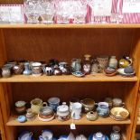 2 shelves of small Studio pottery vases, jugs etc