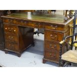 A reproduction mahogany twin-pedestal writing desk, W122cm