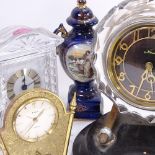 Various clocks and garnitures, including Royal Albert Crystal, and Vintage Russian model