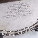 A modern silver presentation tray, with cast-edge on ball feet, presented to Mr H J C Stevens,